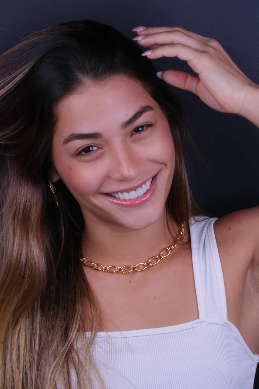 Paciente real do Instituto Breno Rodrigues sorrindo